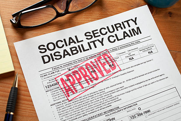 Approved Social Security Disability Claim Form on a desktop Social Security Attorney Rock Hill, SC